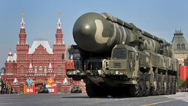 Russian Topol-M intercontinental ballistic misiles drive through Red Square during the Victory Day parade in Moscow. File photo  - Sputnik International