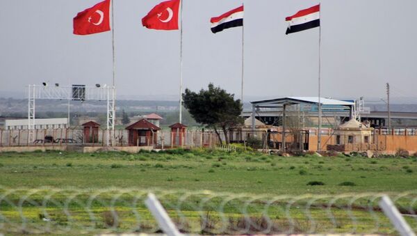 In this photo taken Tuesday, April 10, 2012, the border crossing between Turkey and Syria is seen from a refugee camp near the border, in Kilis , Turkey. - Sputnik International
