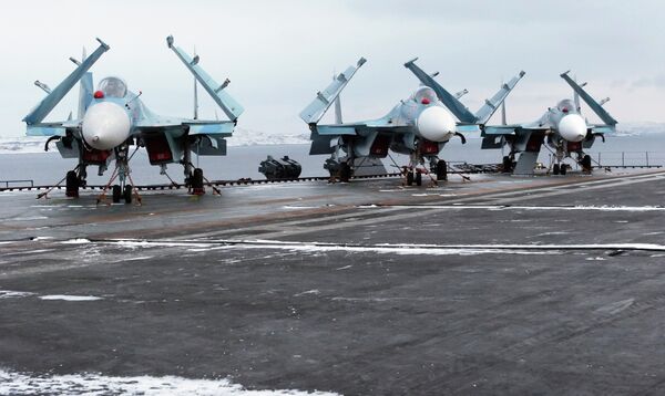 SU-33 fighter jets onboard the Admiral Kuznetsov heavy aircraft carrying cruiser. SU-33 fighter jets onboard the Admiral Kuznetsov heavy aircraft carrying cruiser. - Sputnik International