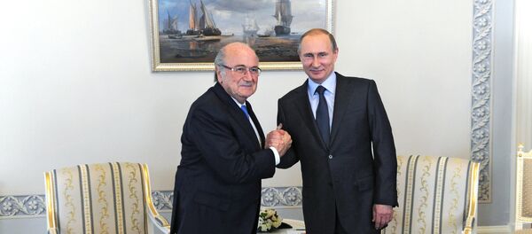 Russian President Vladimir Putin and FIFA head Joseph Blatter Russian President Vladimir Putin and FIFA head Joseph Blatter - Sputnik International