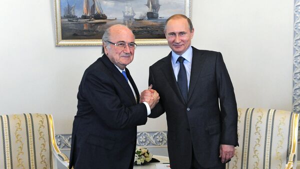 Russian President Vladimir Putin and FIFA head Joseph Blatter - Sputnik International