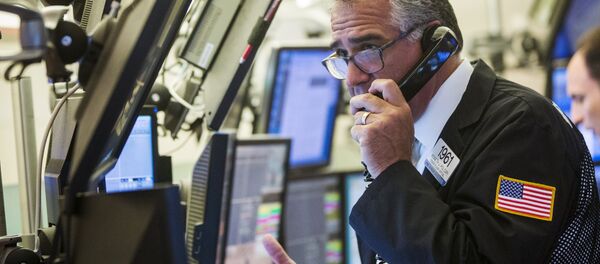 A trader works on the floor of the New York Stock Exchange shortly after the opening bell in New York, July 23, 2015 A trader works on the floor of the New York Stock Exchange shortly after the opening bell in New York, July 23, 2015 - Sputnik International