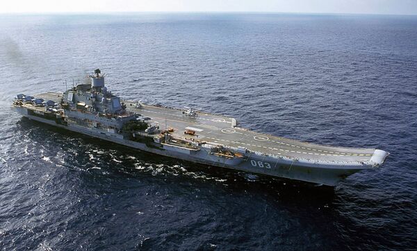 In this file photo from 2004, the Russian Navy's Admiral Kuznetsov aircraft carrier is seen in the Barents Sea, Russia In this file photo from 2004, the Russian Navy's Admiral Kuznetsov aircraft carrier is seen in the Barents Sea, Russia - Sputnik International