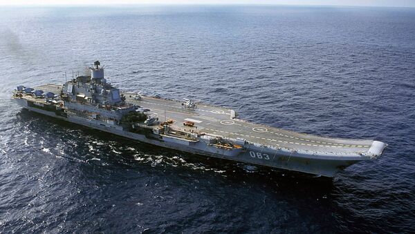 In file photo from 2004, the Russian navy's Admiral Kuznetsov carrier is seen in the Barents Sea, Russia - Sputnik International