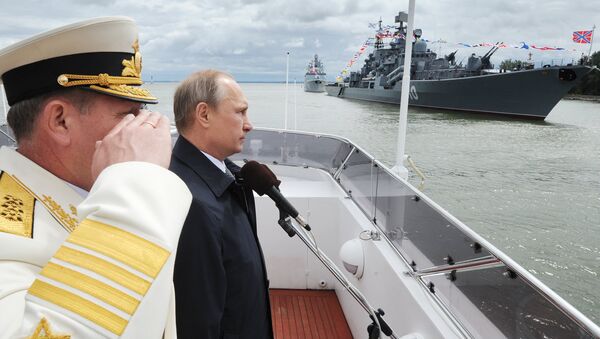 Russian President Vladimir Putin during the military parade held on the Day of the Russian Navy in the city of Baltiysk in Kaliningrad Region - Sputnik International