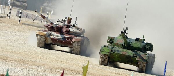 From right: Chinese and Russian crews ride Type 96A and T-72B tanks during a pursuit race of the Tank Biathlon 2014 World Championships at a training center of the Second Guards Taman Motorized Rifle Division in the town of Alabino From right: Chinese and Russian crews ride Type 96A and T-72B tanks during a pursuit race of the Tank Biathlon 2014 World Championships at a training center of the Second Guards Taman Motorized Rifle Division in the town of Alabino - Sputnik International