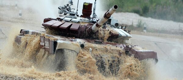 The Russian crew during the Tank Biathlon 2014 world championship in the training ground of the 2nd Guards Taman Motorized Rifle Division, in the village of Alabino The Russian crew during the Tank Biathlon 2014 world championship in the training ground of the 2nd Guards Taman Motorized Rifle Division, in the village of Alabino - Sputnik International