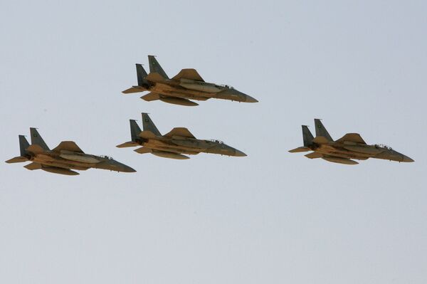 F-15 warplanes of the Saudi Air Force fly over the Saudi Arabian capital Riyadh during a graduation ceremony at King Faisal Air Force University F-15 warplanes of the Saudi Air Force fly over the Saudi Arabian capital Riyadh during a graduation ceremony at King Faisal Air Force University - Sputnik International