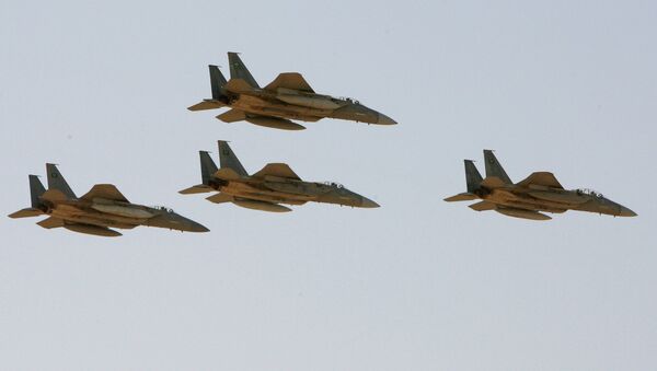 F-15 warplanes of the Saudi Air Force fly over the Saudi Arabian capital Riyadh during a graduation ceremony at King Faisal Air Force University - Sputnik International