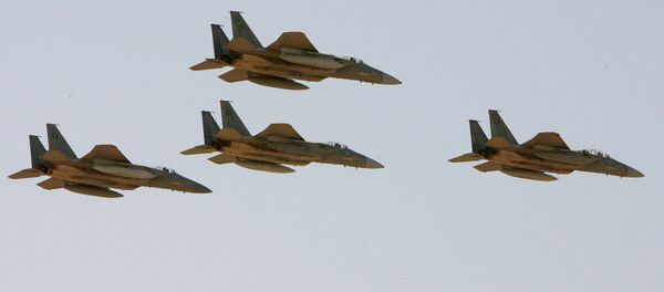 F-15 warplanes of the Saudi Air Force fly over the Saudi Arabian capital Riyadh during a graduation ceremony at King Faisal Air Force University - Sputnik International