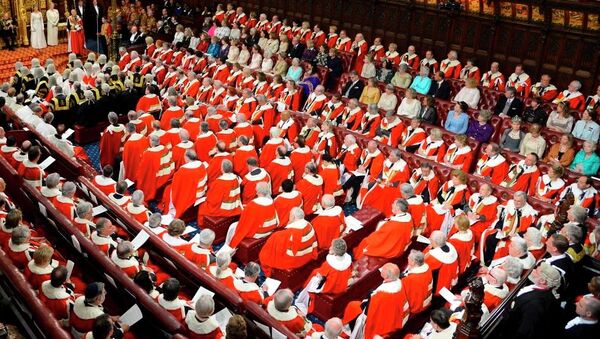 Britain's Queen Elizabeth, rear centre left, delivers her speech at the State Opening of Parliament, in the House of Lords in London Wednesday May 8, 2013. - Sputnik International