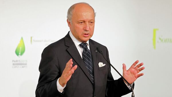 French Foreign Minister Laurent Fabius delivers a speech during the a climate meeting in Paris, France, Tuesday, July 21, 2015 - Sputnik International