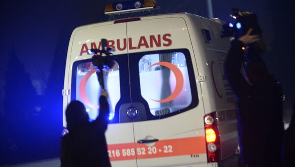 People film as an ambulance drives out of the airport in Istanbul on February 7, 2014. File photo - Sputnik International