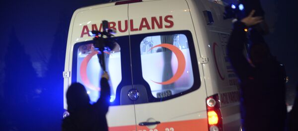 People film as an ambulance drives out of the airport in Istanbul on February 7, 2014 - Sputnik International