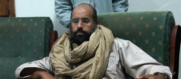 Seif al-Islam is seen after his capture in the custody of revolutionary fighters in Zintan - Sputnik International