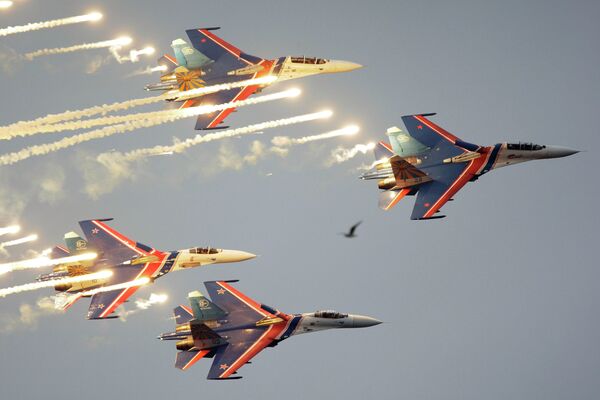 Russian Knights aerobatic team of four Su-27 jet fighters performing at a MAKS international air show. file photo Russian Knights aerobatic team of four Su-27 jet fighters performing at a MAKS international air show. file photo - Sputnik International