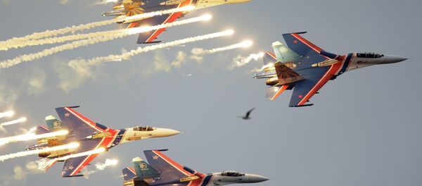 Russian Knights aerobatic team of four Su-27 jet fighters performing at a MAKS international air show. file photo Russian Knights aerobatic team of four Su-27 jet fighters performing at a MAKS international air show. file photo - Sputnik International