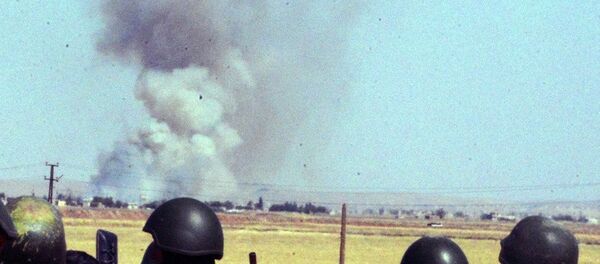 Turkish soldiers stand as smoke billows from the Syrian town of Ayn al-Arab or Kobani following the attacks by IS militants as seen from the Turkish side of the border in Suruc, Turkey, Thursday, June 25, 2015. Turkish soldiers stand as smoke billows from the Syrian town of Ayn al-Arab or Kobani following the attacks by IS militants as seen from the Turkish side of the border in Suruc, Turkey, Thursday, June 25, 2015. - Sputnik International