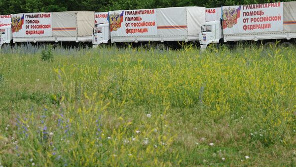 Trucks with humanitarian aid for southeastern Ukraine in the village of Kovalyovka, the Rostov Region - Sputnik International