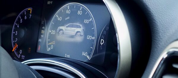 An electronic dashboard of a 2015 Jeep Grand Cherokee is pictured on a car dealership in New Jersey, July 24, 2015 - Sputnik International