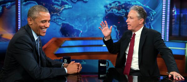 President Barack Obama talks with Jon Stewart, host of The Daily Show, during a taping on Tuesday, July 21, 2015, in New York. - Sputnik International
