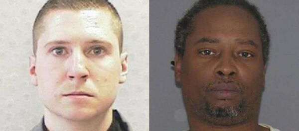 University of Cincinnati police officer Ray Tensing, left, was charged with murder after shooting and killing Sam DuBose during a July 19 traffic stop. - Sputnik International