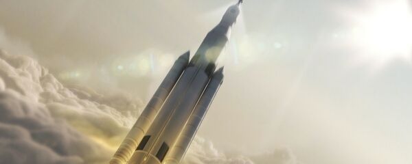 Artist's concept showing the 77-ton configuration of NASA’s Space Launch System rocket launching into space. Artist's concept showing the 77-ton configuration of NASA’s Space Launch System rocket launching into space. - Sputnik International