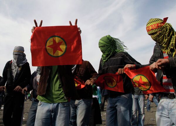 Masked men display flags of outlawed rebel group of the PKK, as Turkish Kurds celebrate the Nowruz in Istanbul, Turkey, Sunday, March 21, 2010 Masked men display flags of outlawed rebel group of the PKK, as Turkish Kurds celebrate the Nowruz in Istanbul, Turkey, Sunday, March 21, 2010 - Sputnik International