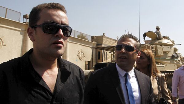 Al Jazeera television journalists Mohamed Fahmy (R) and Baher Mohamed talk to the media outside Tora prison, in Cairo, Egypt, July 30, 2015 - Sputnik International