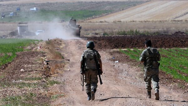 Turkish soldiers patrol near the border with Syria, ouside the village of Elbeyli, east of the town of Kilis, southeastern Turkey - Sputnik International