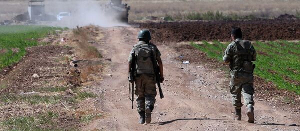 Turkish soldiers patrol near the border with Syria, ouside the village of Elbeyli, east of the town of Kilis, southeastern Turkey Turkish soldiers patrol near the border with Syria, ouside the village of Elbeyli, east of the town of Kilis, southeastern Turkey - Sputnik International