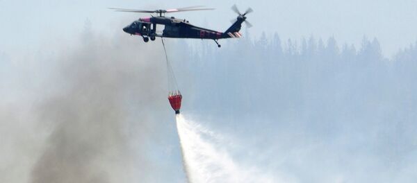 California’s citizen Soldiers and Airmen help extinguish raging wildfires California’s citizen Soldiers and Airmen help extinguish raging wildfires - Sputnik International
