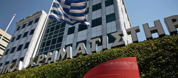 A Greek flag flutters outside the Athens stock exchange , Greece, July 27, 2015 A Greek flag flutters outside the Athens stock exchange , Greece, July 27, 2015 - Sputnik International