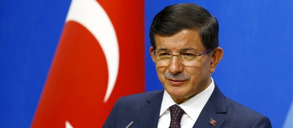 Turkey's Prime Minister Ahmet Davutoglu speaks during a news conference at his ruling AK Party (AKP) headquarters in Ankara, Turkey, July 13, 2015 - Sputnik International