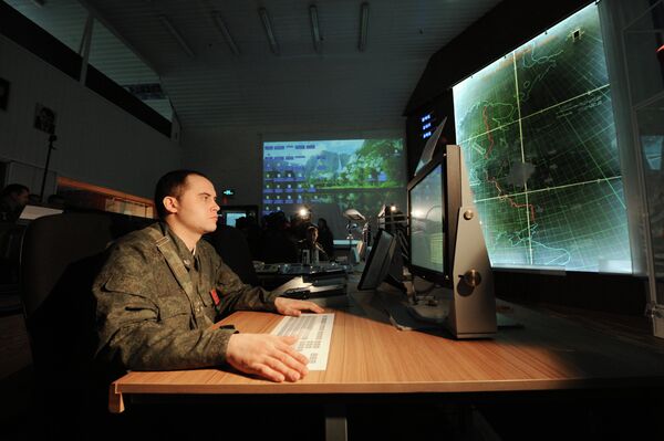 Officers with the 4th Brigade Air Defense (NORAD) air and space defense (ASD) forces in the combat control room in the Moscow region Officers with the 4th Brigade Air Defense (NORAD) air and space defense (ASD) forces in the combat control room in the Moscow region - Sputnik International