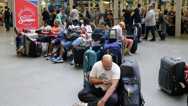 People queue as they wait at the St. Pancras international train station terminal in London, Thursday, July 2, 2015. File photo - Sputnik International