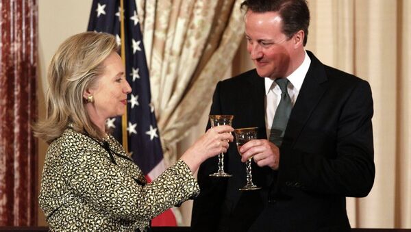 Secretary of State Hillary Rodham Clinton makes a toast with British Prime Minister David Cameron during a luncheon at the State Department in Washington, Wednesday, March 14, 2012. - Sputnik International