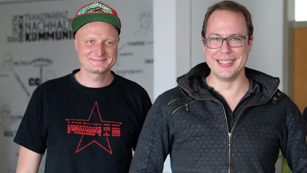 Markus Beckedahl, founder of the website Netzpolitik.org, right, and author of a blog Andre Meister, left, pose in their office in Berlin, Germany - Sputnik International