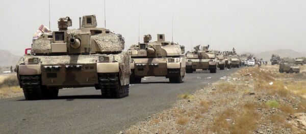 Tanks of fighters loyal to Yemen's President Abd-Rabbu Mansour Hadi are seen on a road leading to the al-Anad military and air base in the country's southern province of Lahej August 3, 2015 - Sputnik International