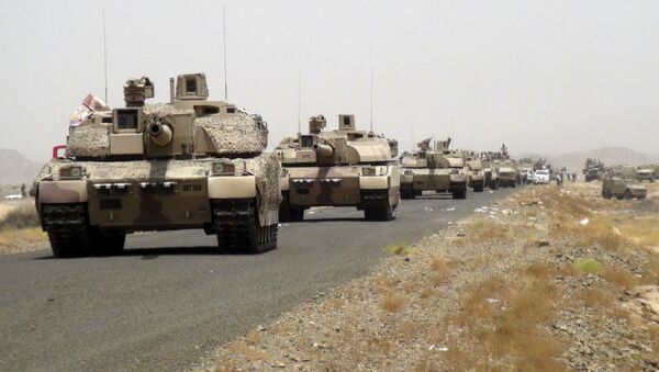 Tanks of fighters loyal to Yemen's President Abd-Rabbu Mansour Hadi are seen on a road leading to the al-Anad military and air base in the country's southern province of Lahej August 3, 2015 - Sputnik International