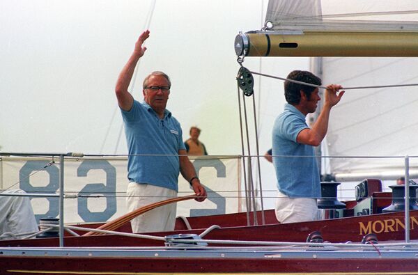 Britain's Prime Minister Edward Heath waves while at the helm of his yacht 'Morning Cloud' during the Admiral's Cup Yacht Race, Cowes, Isle of Wight, England, July 30, 1971 - Sputnik International