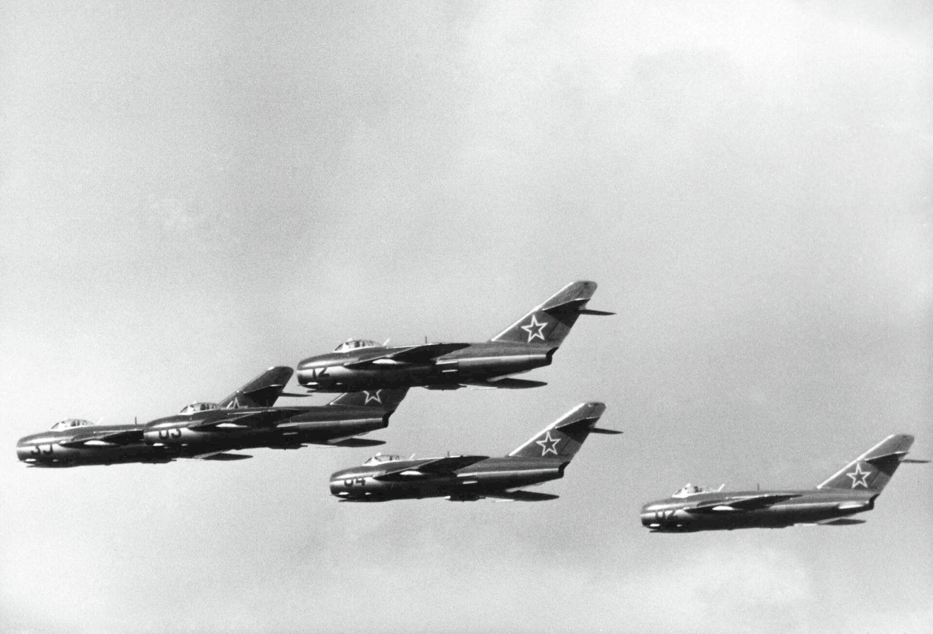 Russian MIG 15 jet fighters during a demonstration at the East German Air Force Sports and Cultural Festival, at Cottbus, East Germany, on Sept. 3, 1957 - Sputnik International, 1920, 12.09.2023