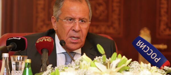 Russia's Foreign Minister Sergey Lavrov speaks during a joint press conference with Qatari Foreign Minister Khalid bin Mohammad Al-Attiyah (unseen) on August 3, 2015 in Doha - Sputnik International