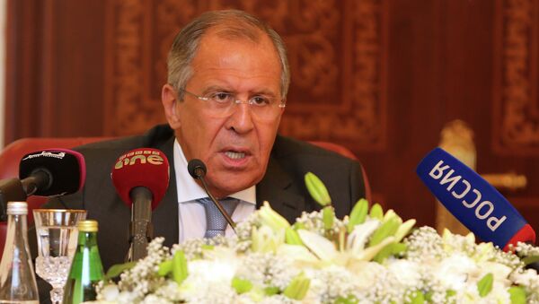 Russia's Foreign Minister Sergey Lavrov speaks during a joint press conference with Qatari Foreign Minister Khalid bin Mohammad Al-Attiyah (unseen) on August 3, 2015 in Doha - Sputnik International