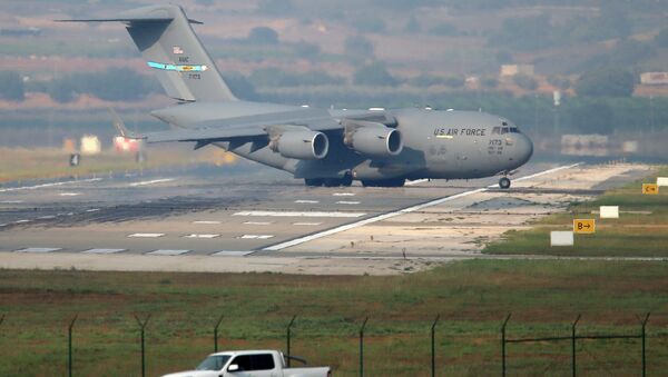 A United States Air Force cargo plane maneuvers on the runway after it landed at the Incirlik Air Base, on the outskirts of the city of Adana, southern Turkey, Friday, July 31, 2015 - Sputnik International