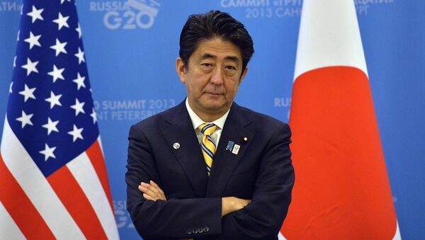 Japan’s Prime Minister Shinzo Abe waits for US President to arrive for a bilateral meeting on the sideline of the G20 summit in Saint Petersburg on September 5, 2013 - Sputnik International