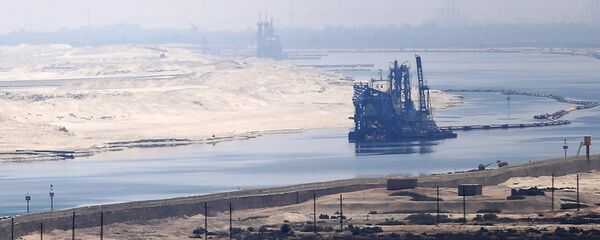 A general view of the Suez Canal from Al Salam Peace bridge on the Ismalia desert road before the opening ceremony of the New Suez Canal, in Egypt - Sputnik International