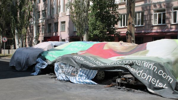 Four of six OSCE mission cars burned in Donetsk - Sputnik International