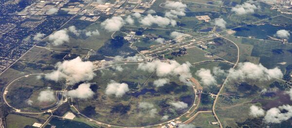 Fermi National Accelerator Laboratory (Fermilab), located just outside Batavia, Illinois. A particle accelerator Fermi National Accelerator Laboratory (Fermilab), located just outside Batavia, Illinois. A particle accelerator - Sputnik International