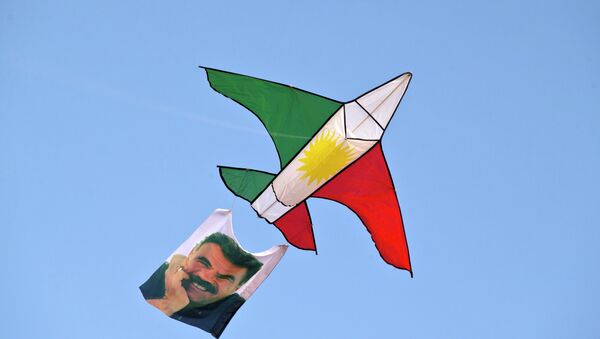 A kite in the colors of the Kurdish flag and with a photograph Abdullah Ocalan, the imprisoned leader of the Kurdistan Workers' Party (PKK) - Sputnik International
